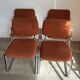 Vintage 70s orange tubular chairs