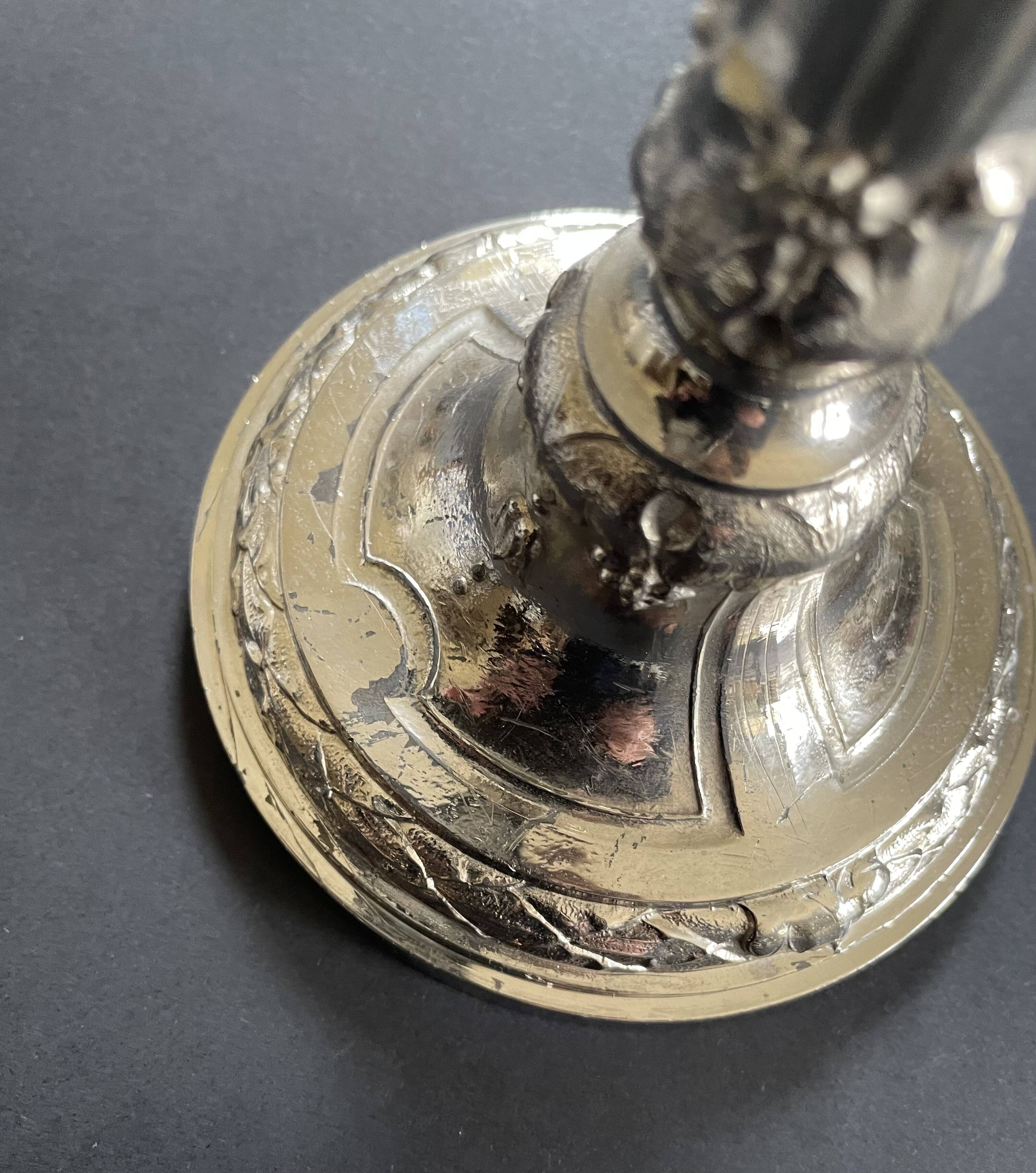 Antique silver-plated candlesticks in classic style