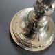 Antique silver-plated candlesticks in classic style