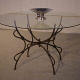 Folding wrought iron table base and indoor/outdoor glass top