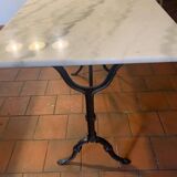 Bistro table in white marble and cast iron