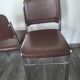 Lot de 4 chaises fauteuil en skaï marron année 1970