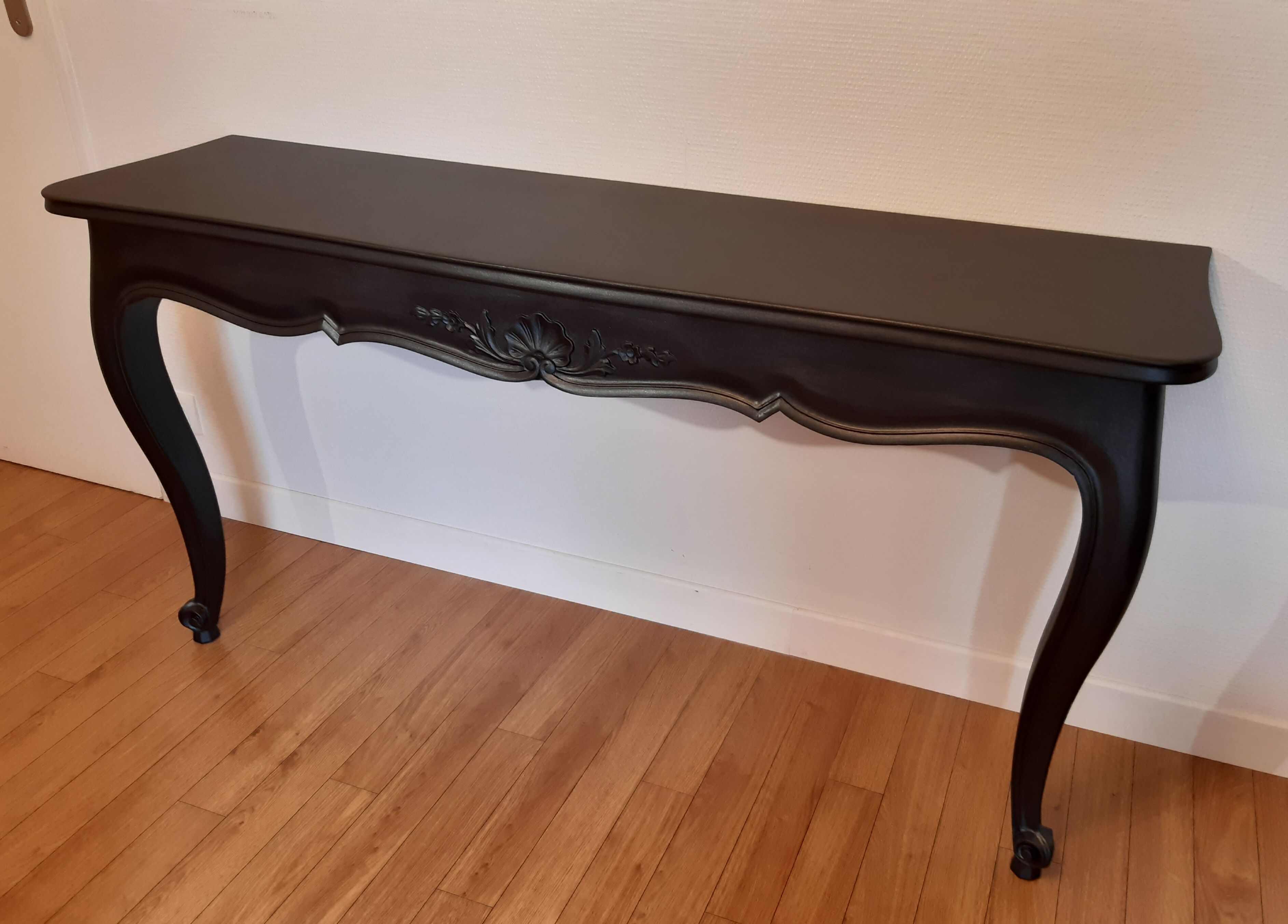 Louis XV-style black wall console