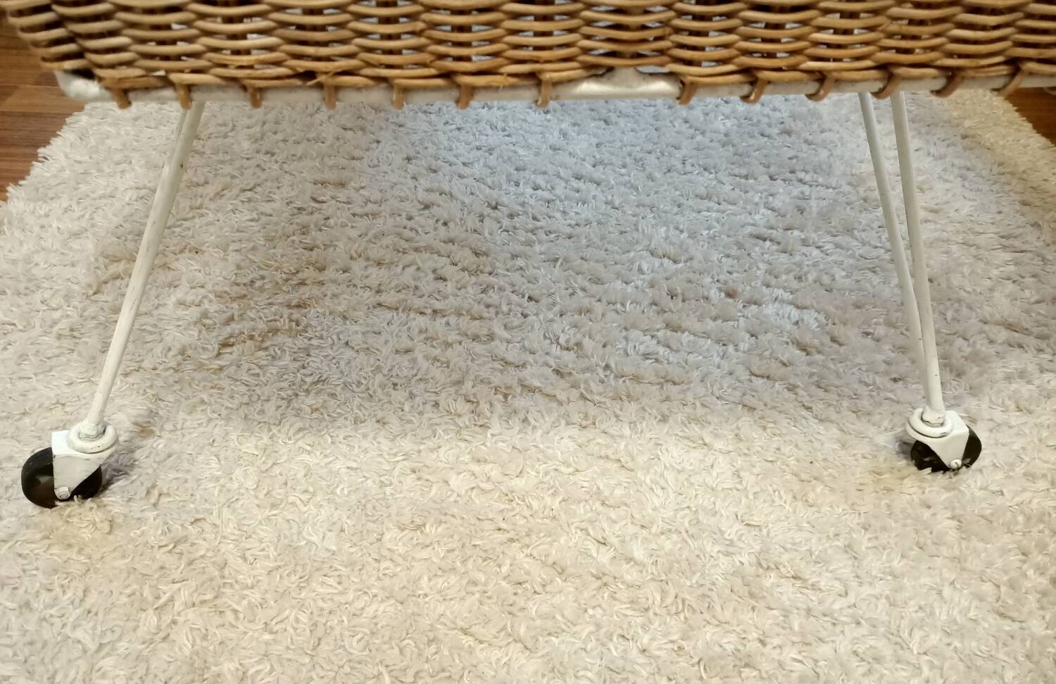 Rattan and wrought iron cradle