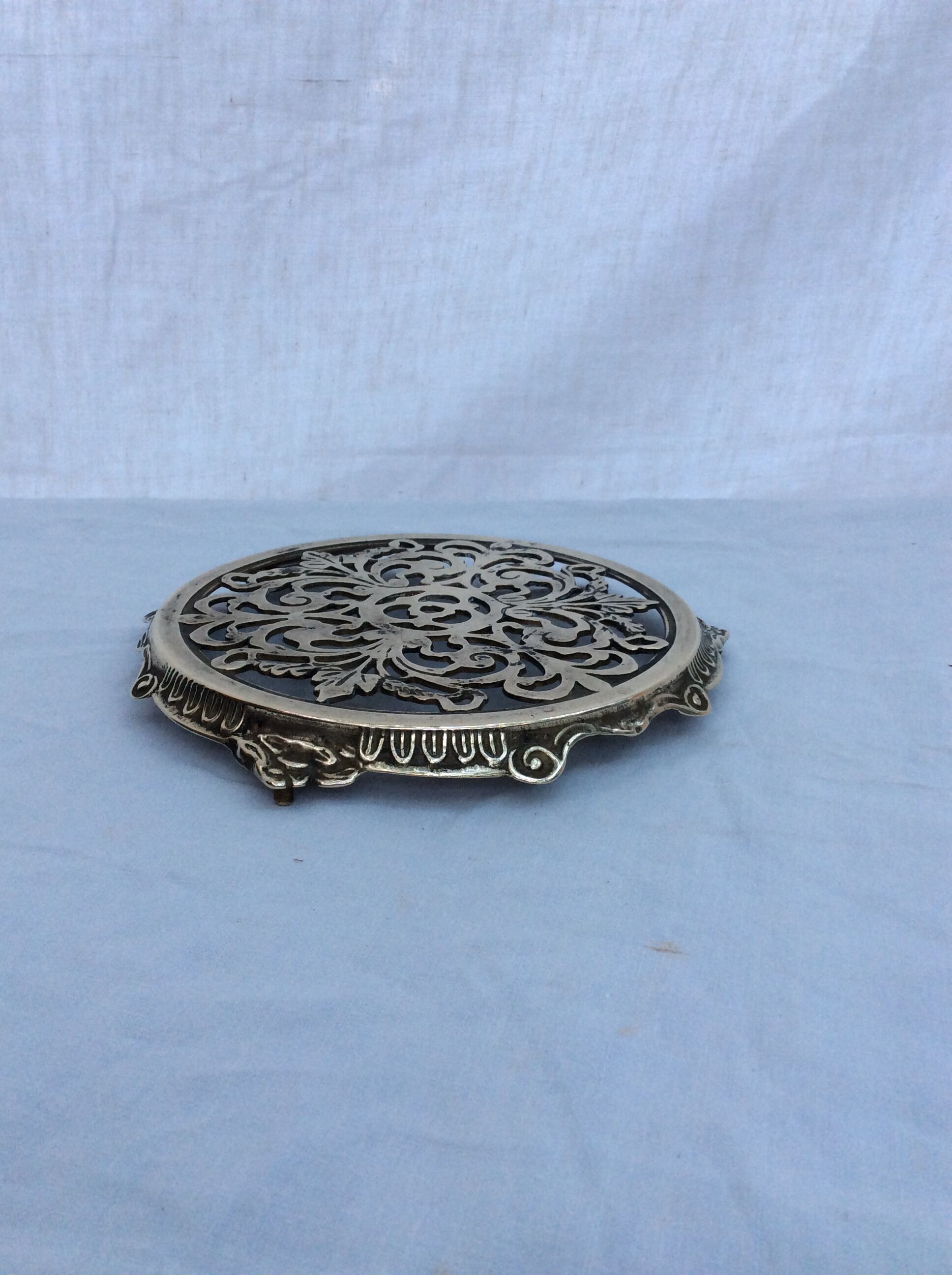 Round flat in vintage brass
