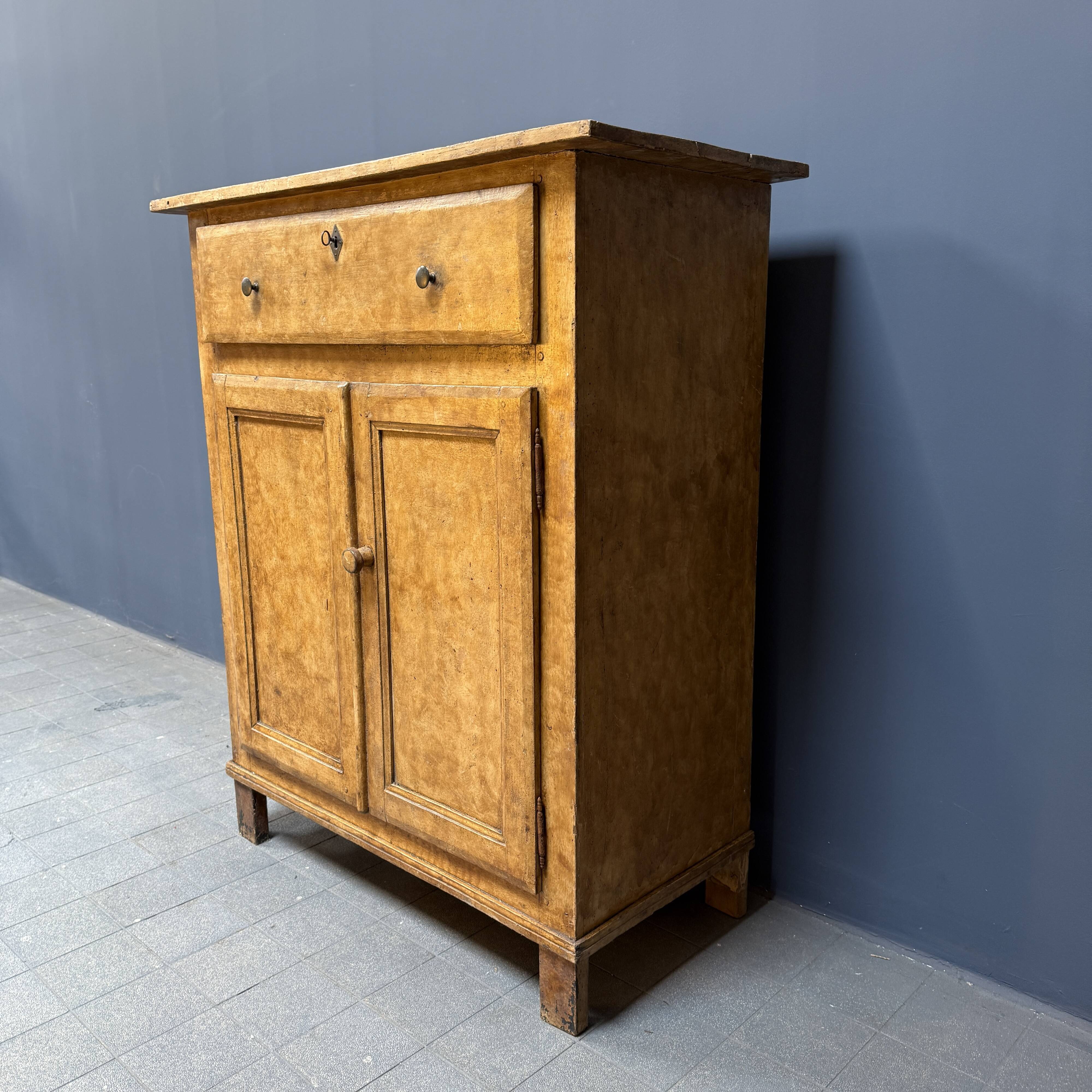 Old marbled ochre yellow French farmhouse cabinet