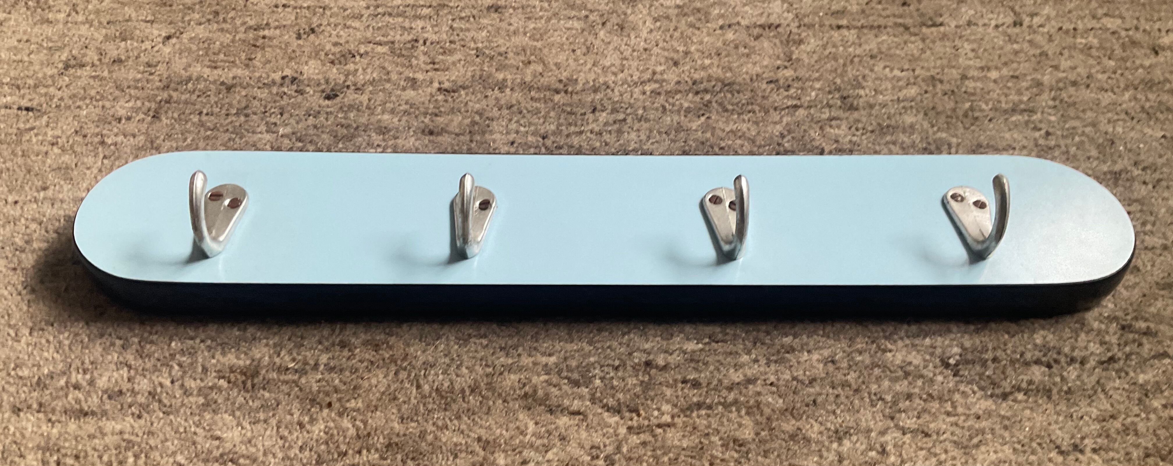 1960s towel rack in blue Formica