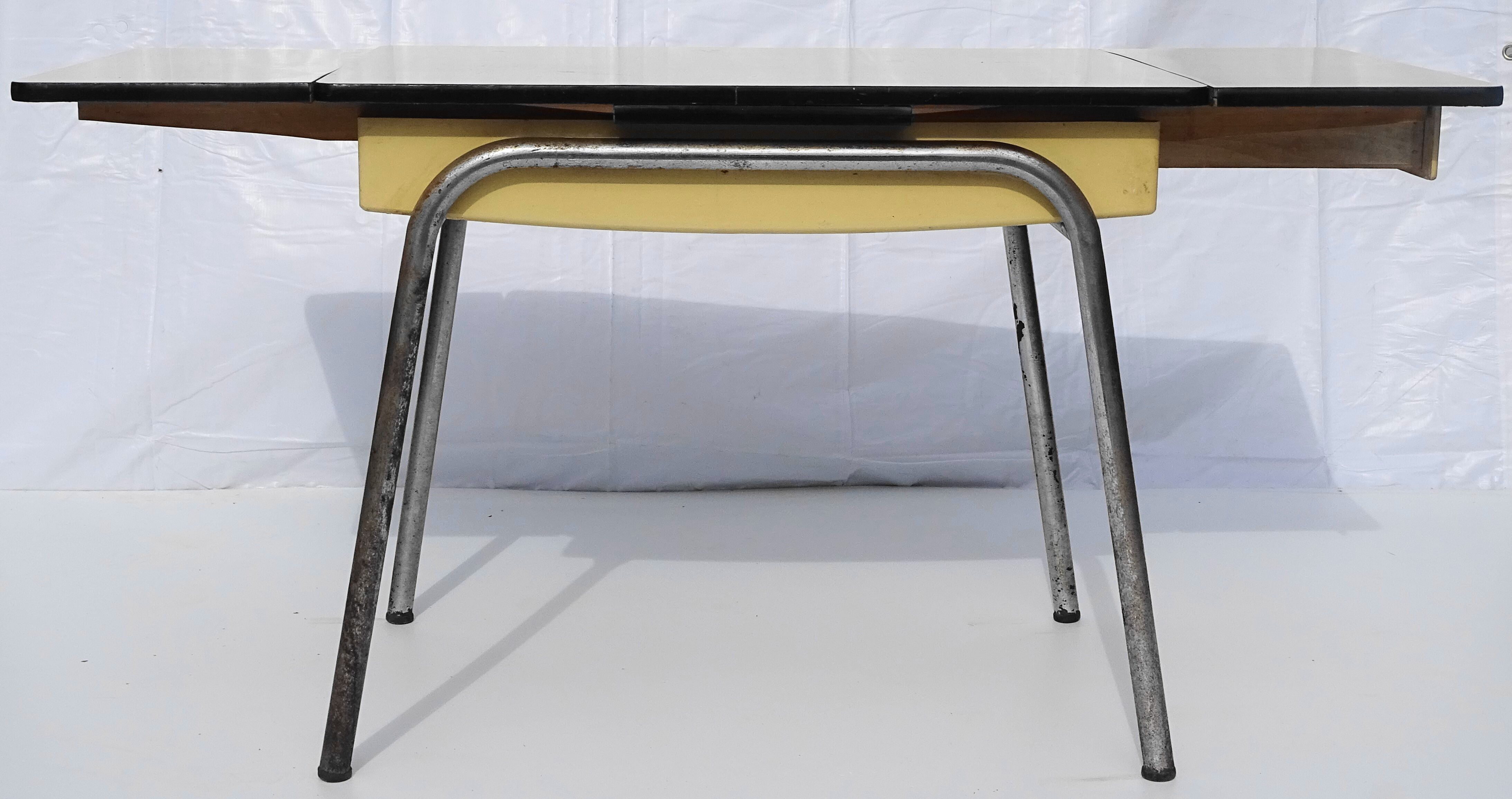Table à rallonges en formica