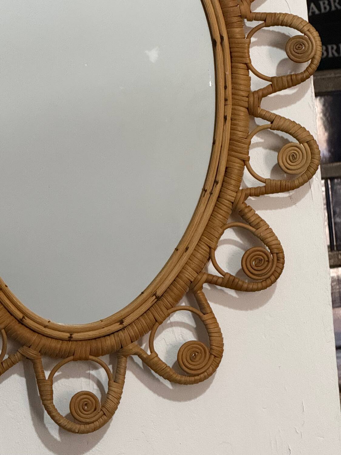 Oval rattan mirror from the 1950s France