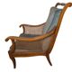 Fauteuil bergère style Régence en bois, tissu et cannage