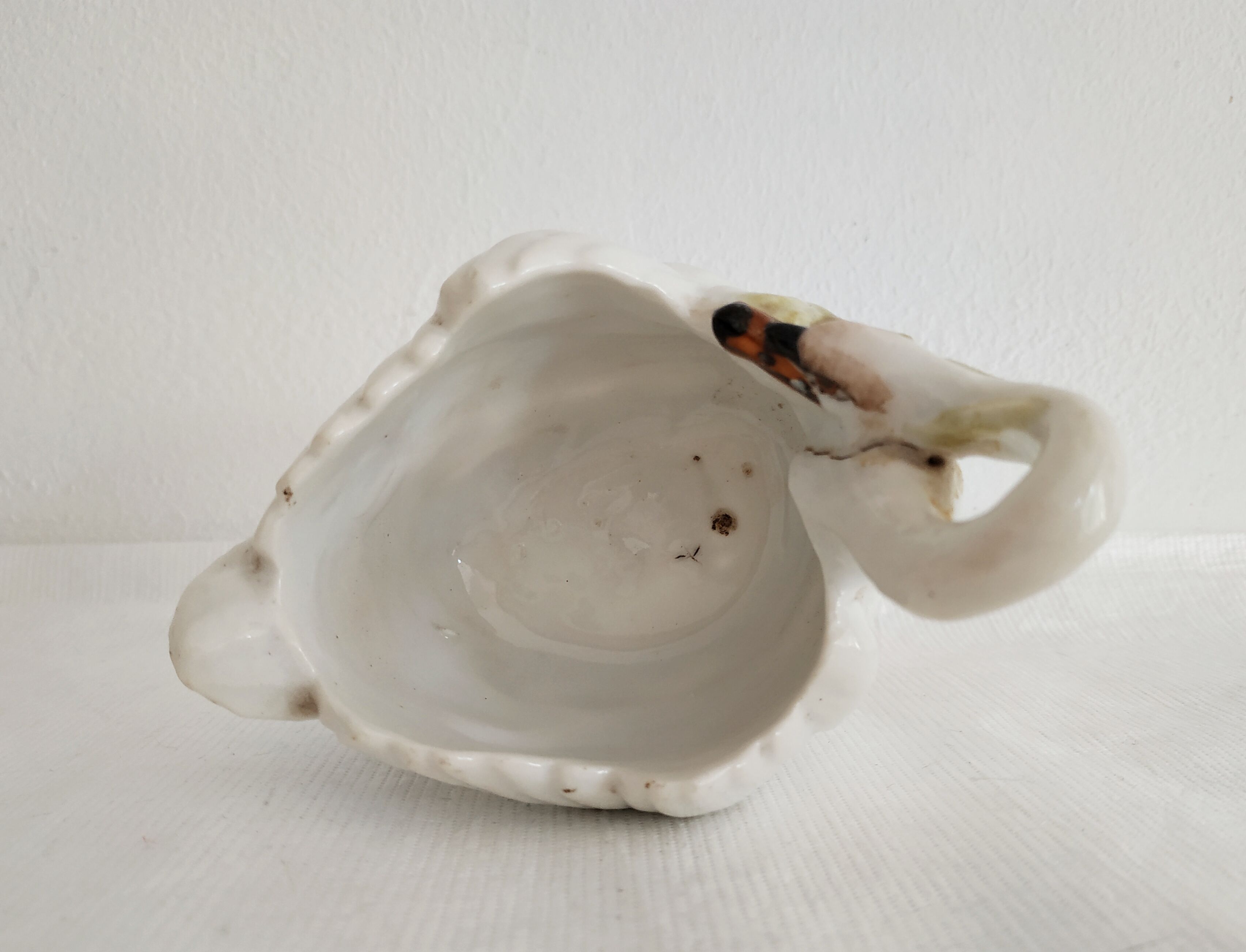 Mustard and salty swans, circa 1900