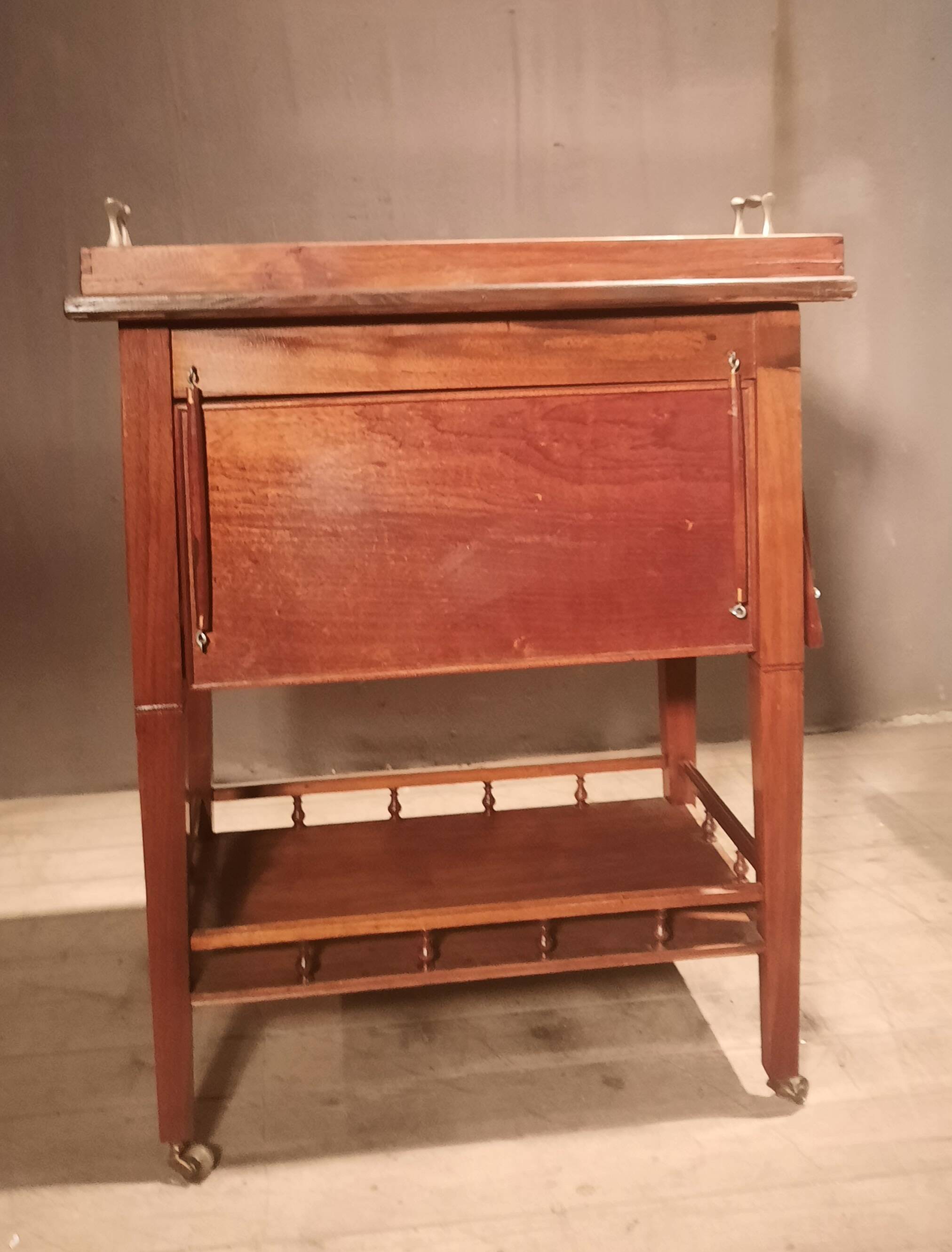 Sideboard with four drop-leaves