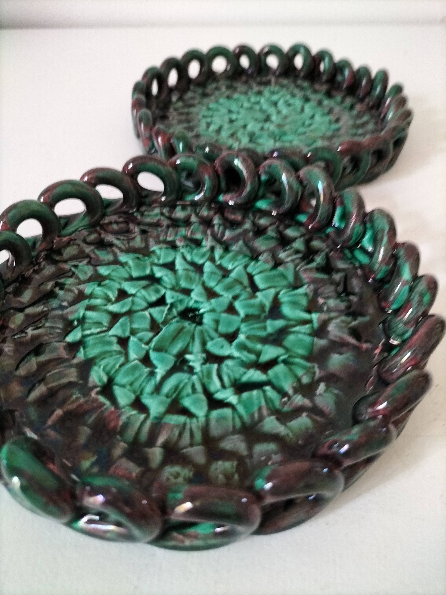 Pair of enamelled woven ceramic trinket trays signed BL, Le Brusc (Var)