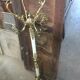 Coat holder on onyx and gold metal foot