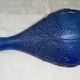 Blue glass bottle, engraved molded