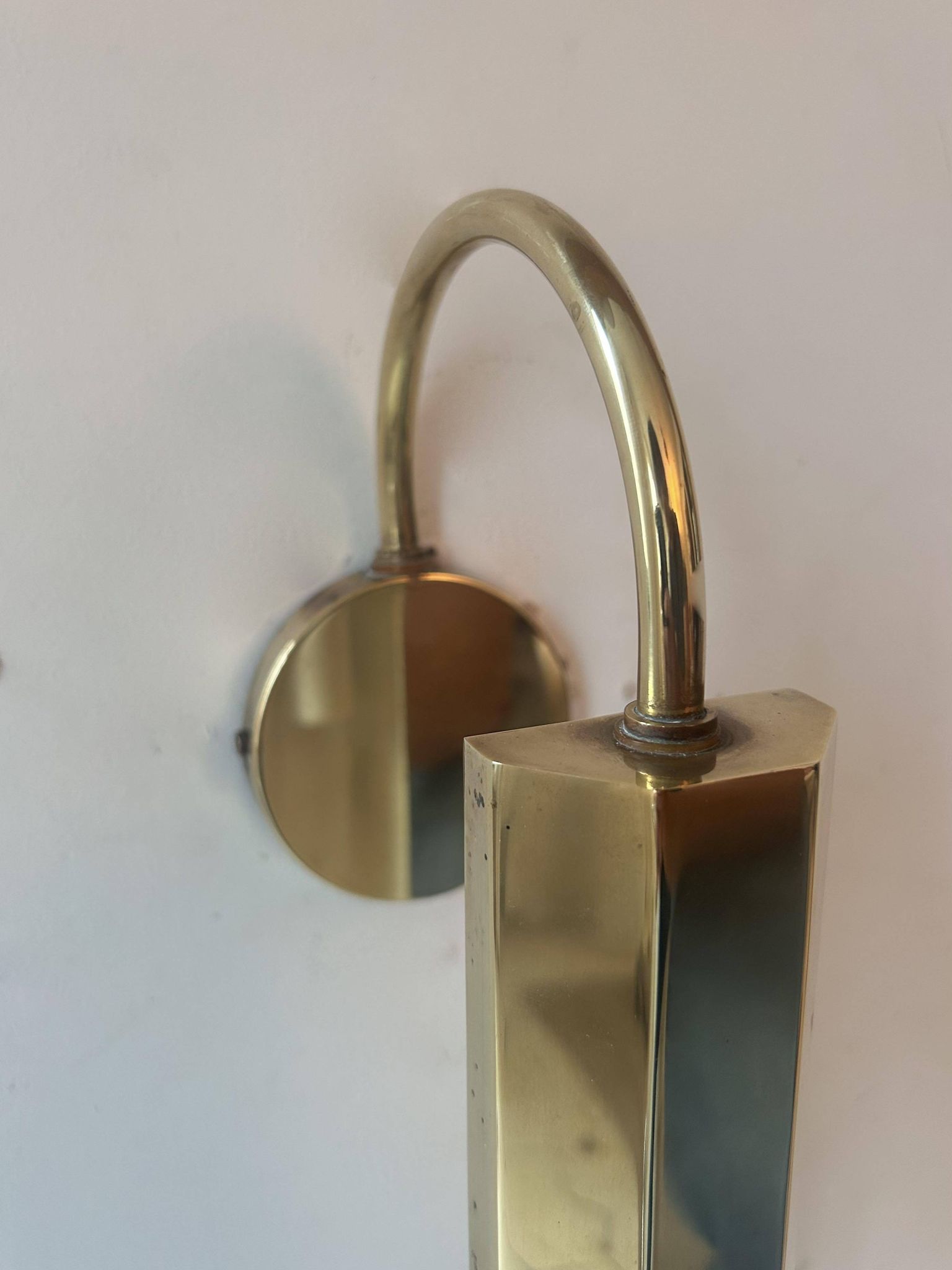Pair of vintage adjustable wall lights, solid brass, France 1970