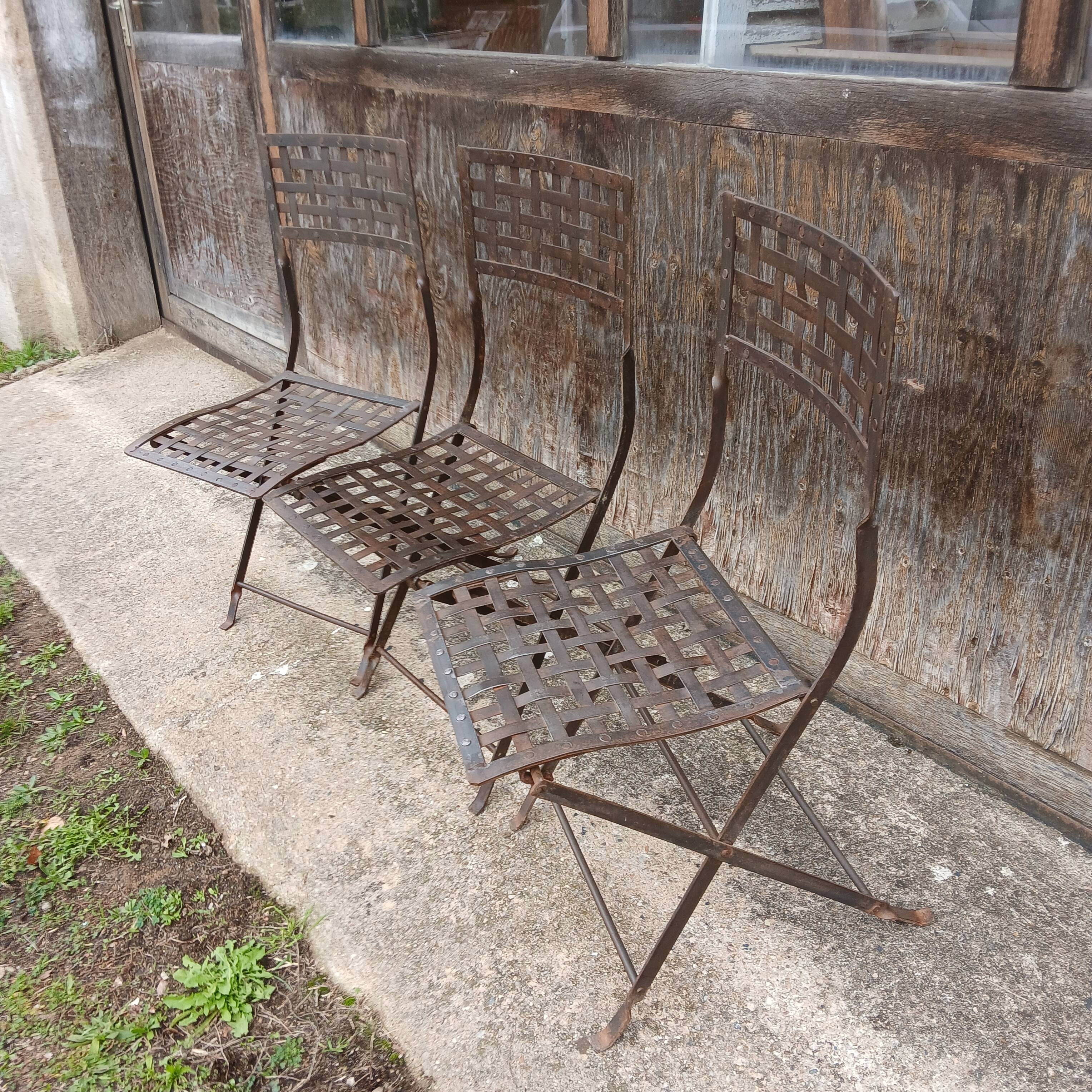 3 wrought iron chairs