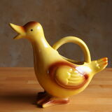 Ceramic watering can in white earthenware, yellow enamel and bird shape