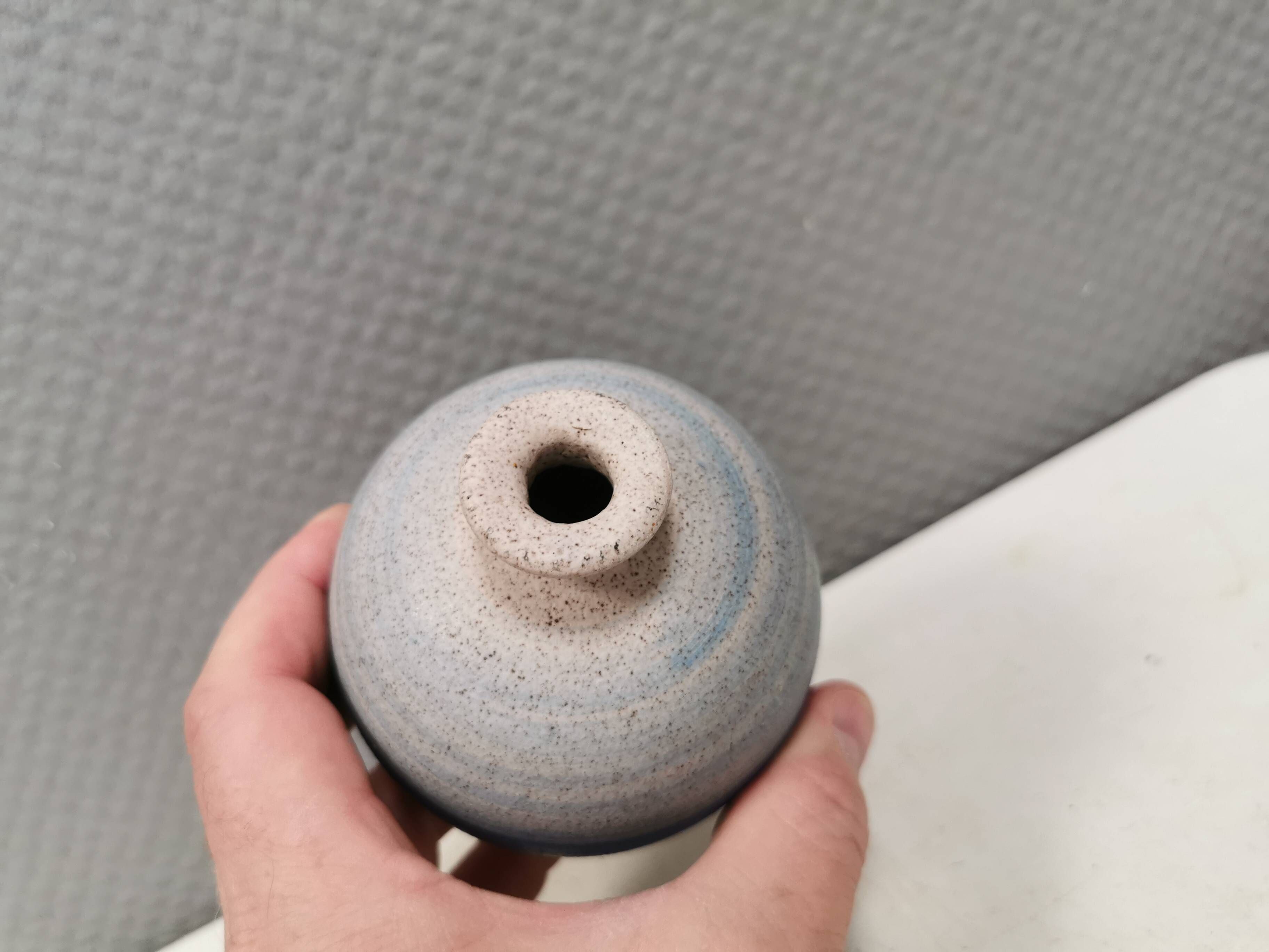 A small, round, beautiful ceramic vase from Denmark, dating from the 1980s.