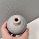 A small, round, beautiful ceramic vase from Denmark, dating from the 1980s.