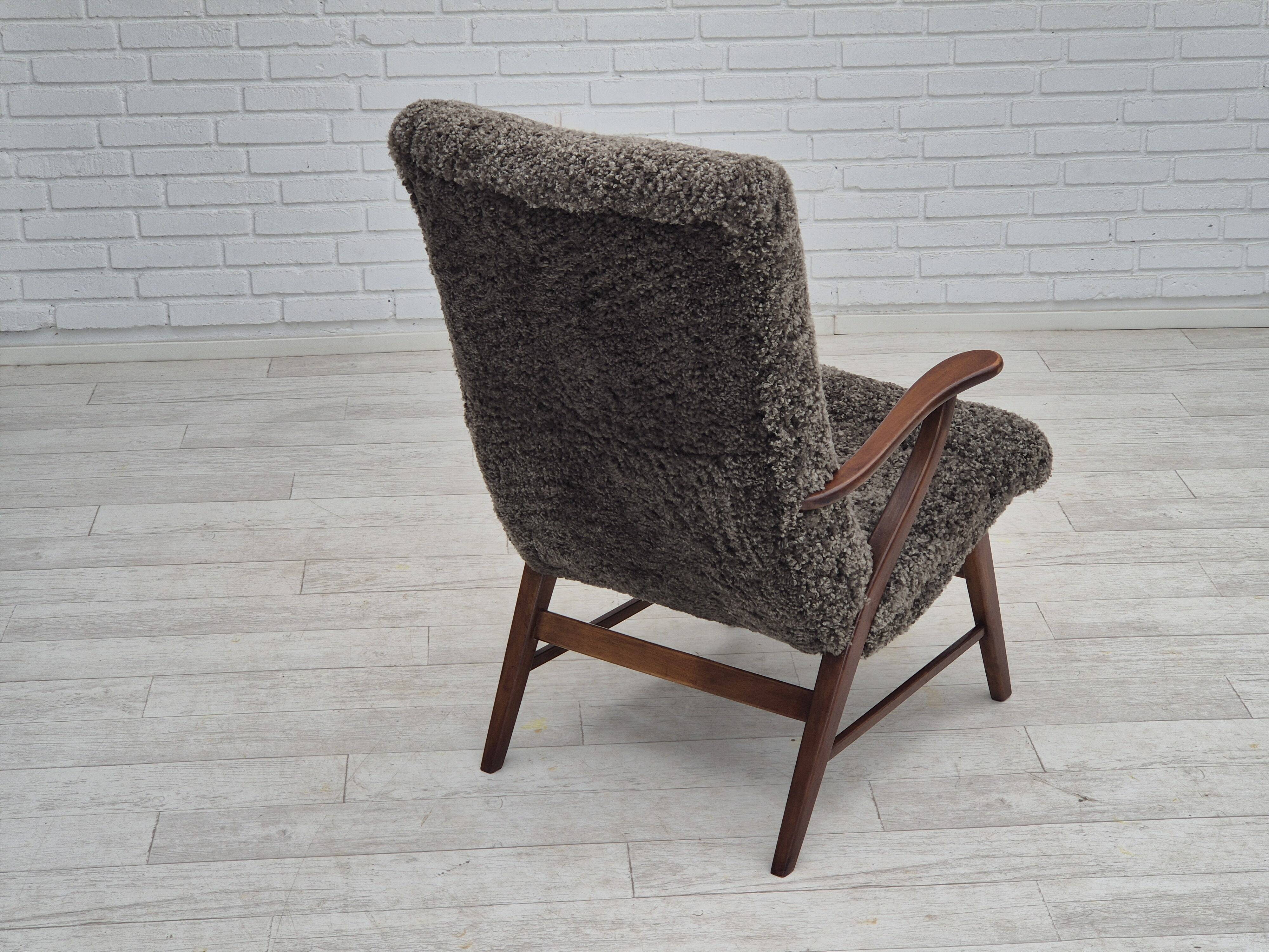 60s, Danish design, refurbished armchair, genuine sheepskin "Wellington".