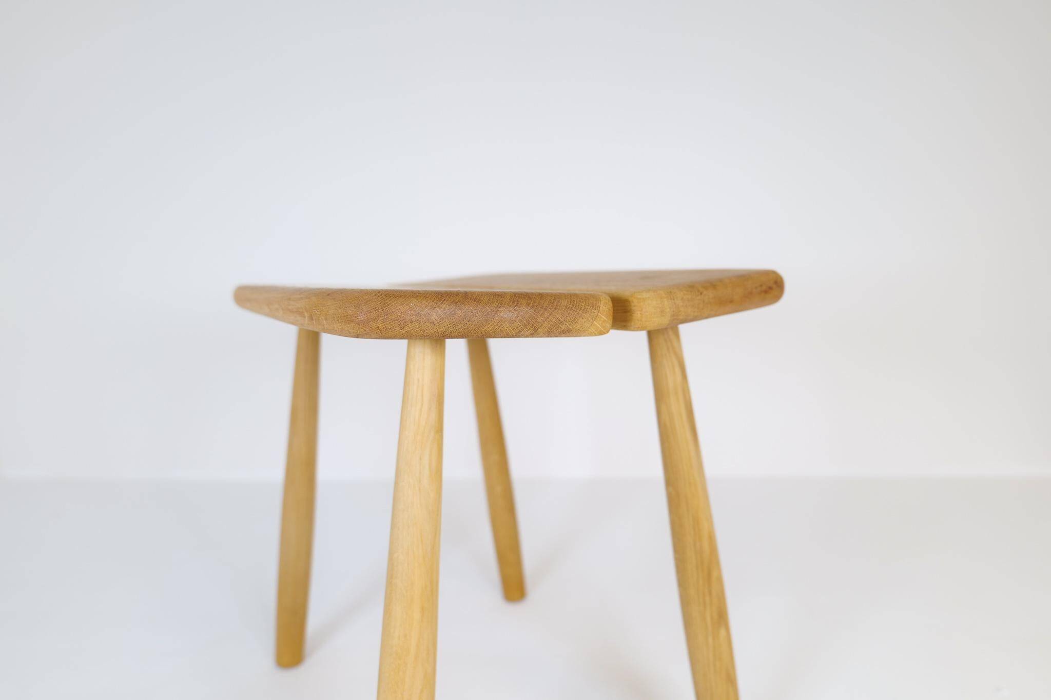 Sculptural mid-century stool in solid oak by Carl Gustaf Boulogner, Sweden, 1950s.