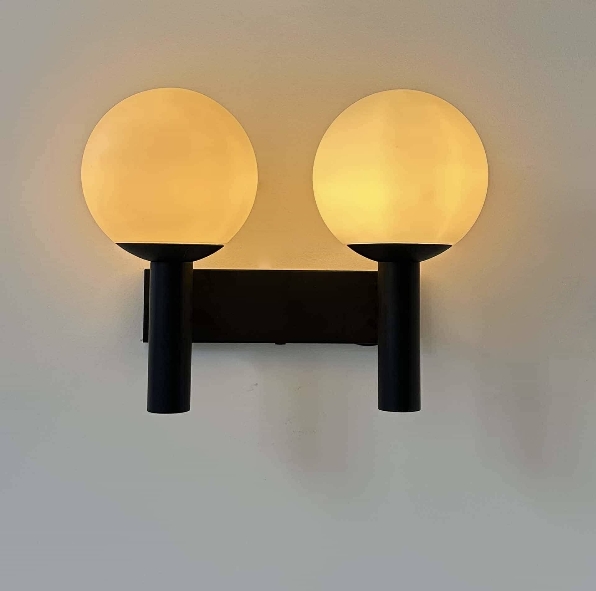 Vintage double wall lamp, opaline and black lacquered metal, Raak Netherlands 1960