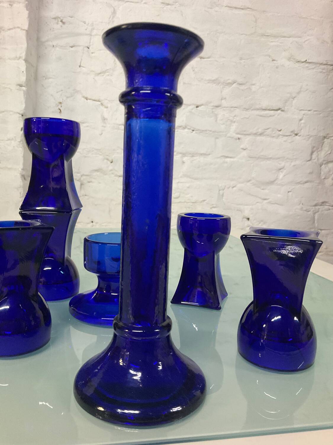 Set of 7 vintage cobalt blue glass footed candlesticks
