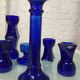 Set of 7 vintage cobalt blue glass footed candlesticks