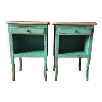 Pair of bedside tables with aged patina