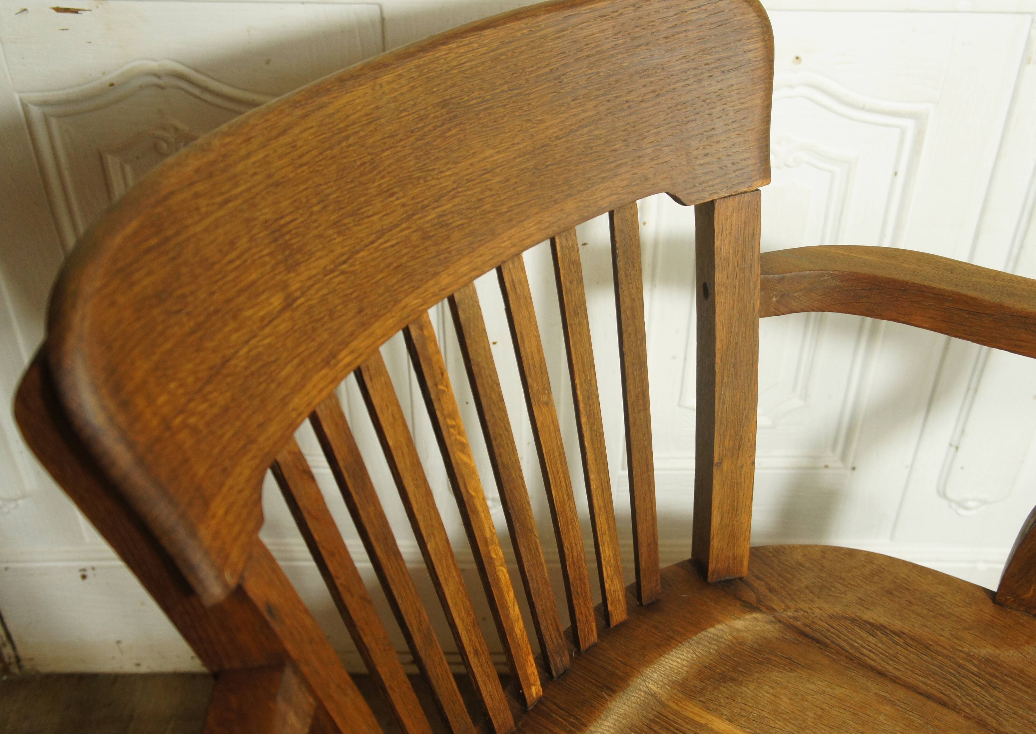 American solid oak armchair, swivel 360 °, tilting & adjustable in height. c. 1920