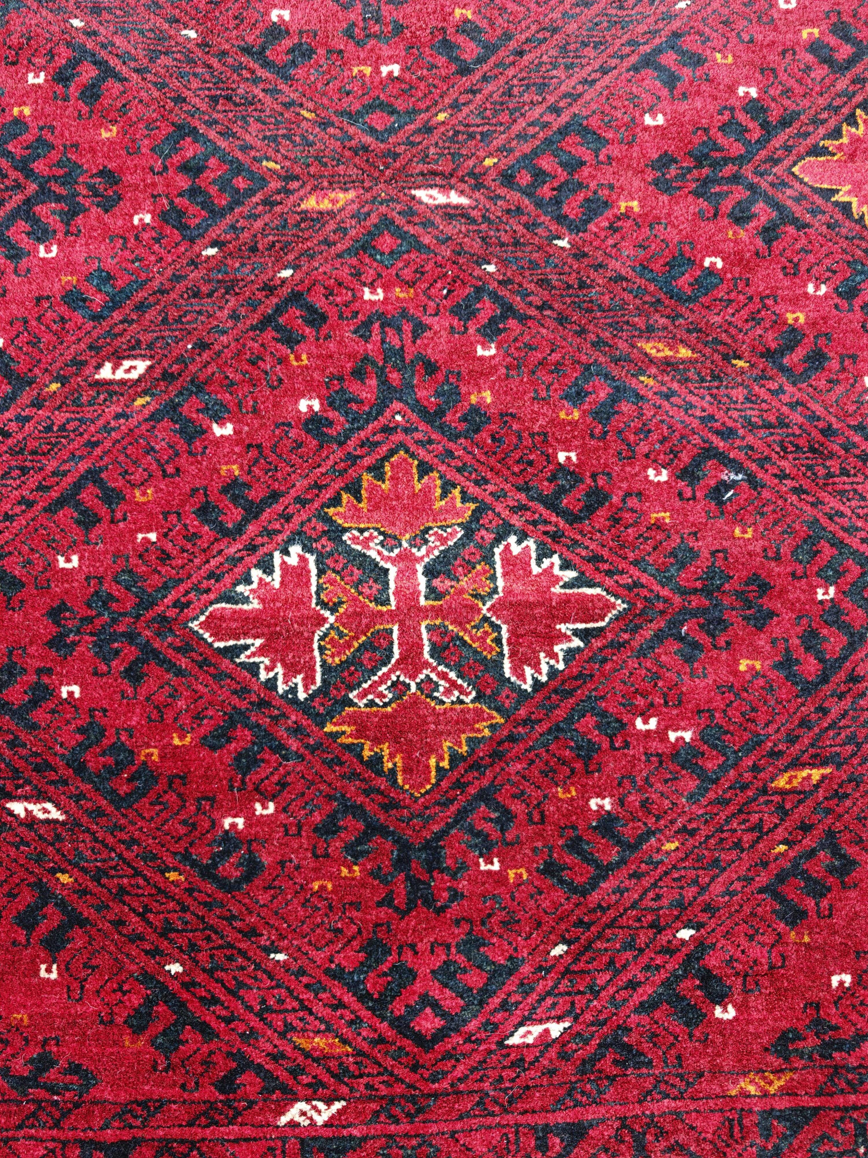 Vintage hand-knotted Kunduz rug, natural dyes, 1940s.