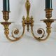 Pair of double wall lamps directoire style Lucien Gau in solid bronze gilded with bright gold