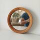 Vintage round wooden mirror