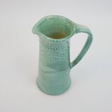 Large green ceramic pitcher with leopard enamel