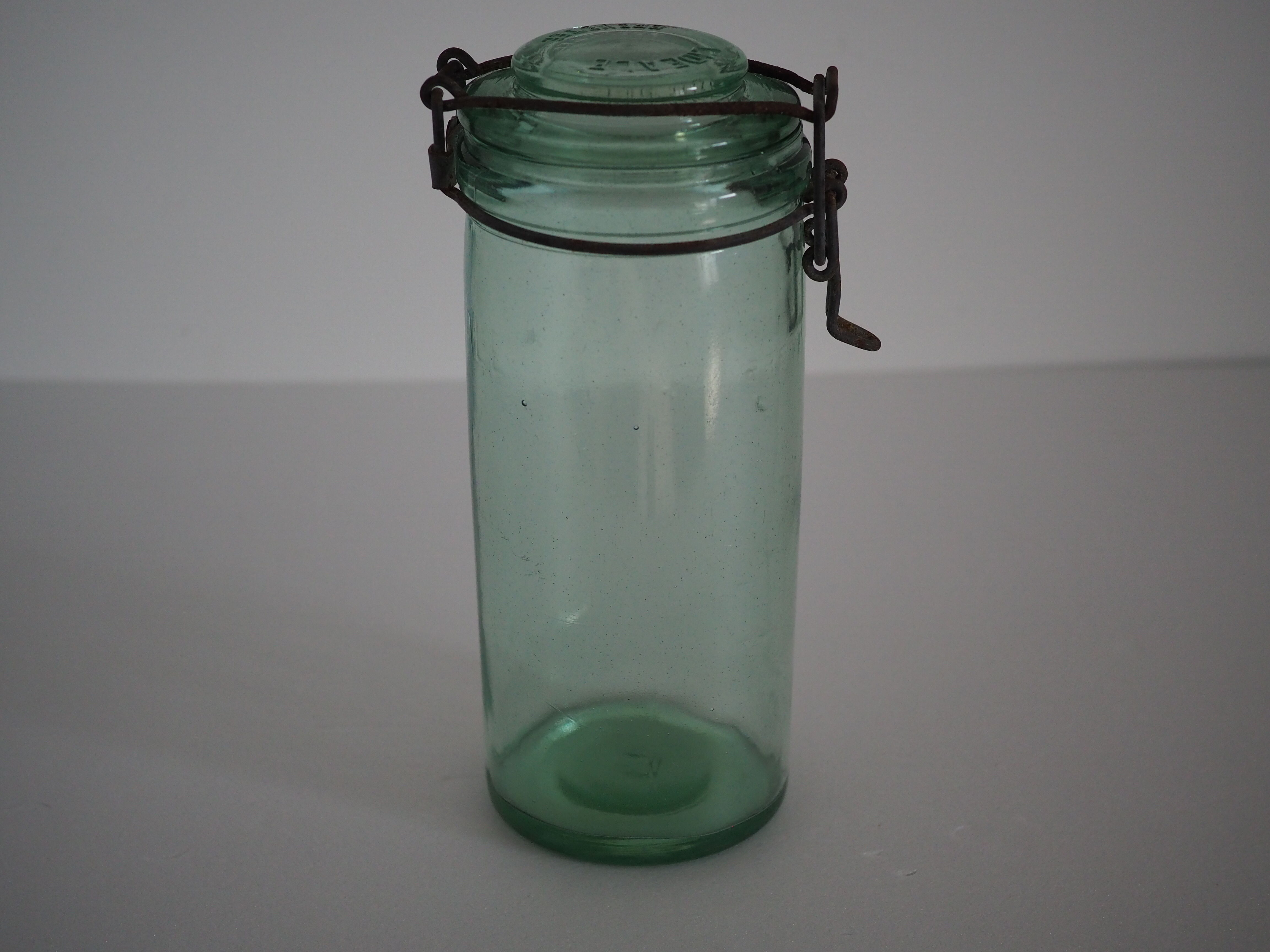 Green "ideale" glass canning jar