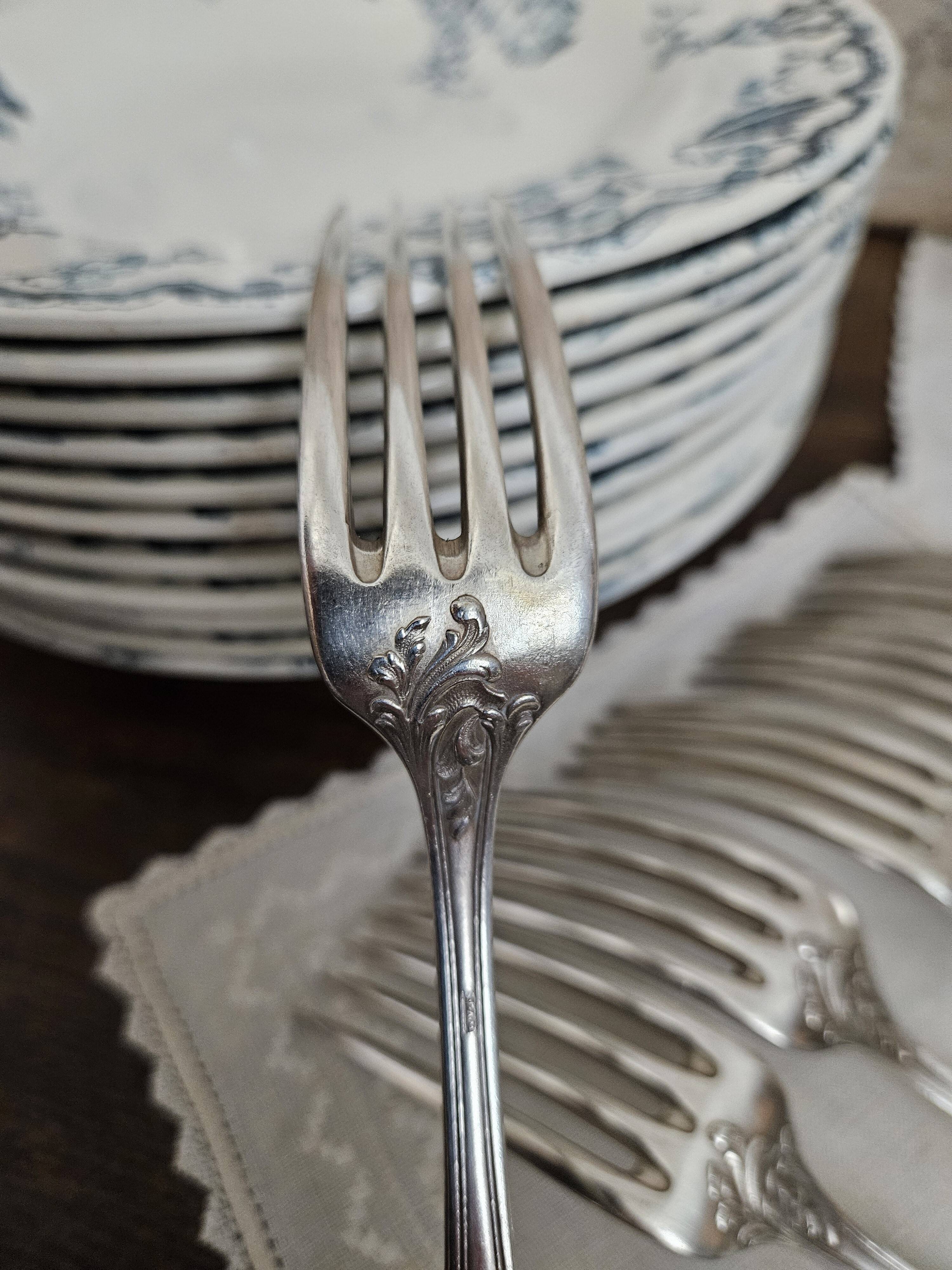 6 silver metal forks