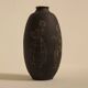 Ceramic vase decorated with women and a tree.