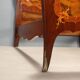 Antique baroque double bed in walnut and mahogany, 20th century.