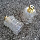 Duo of vintage molded glass globe pendant lights.