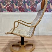 ARMCHAIR AND ITS OTTOMAN "SCANDINAVIAN DESIGN".