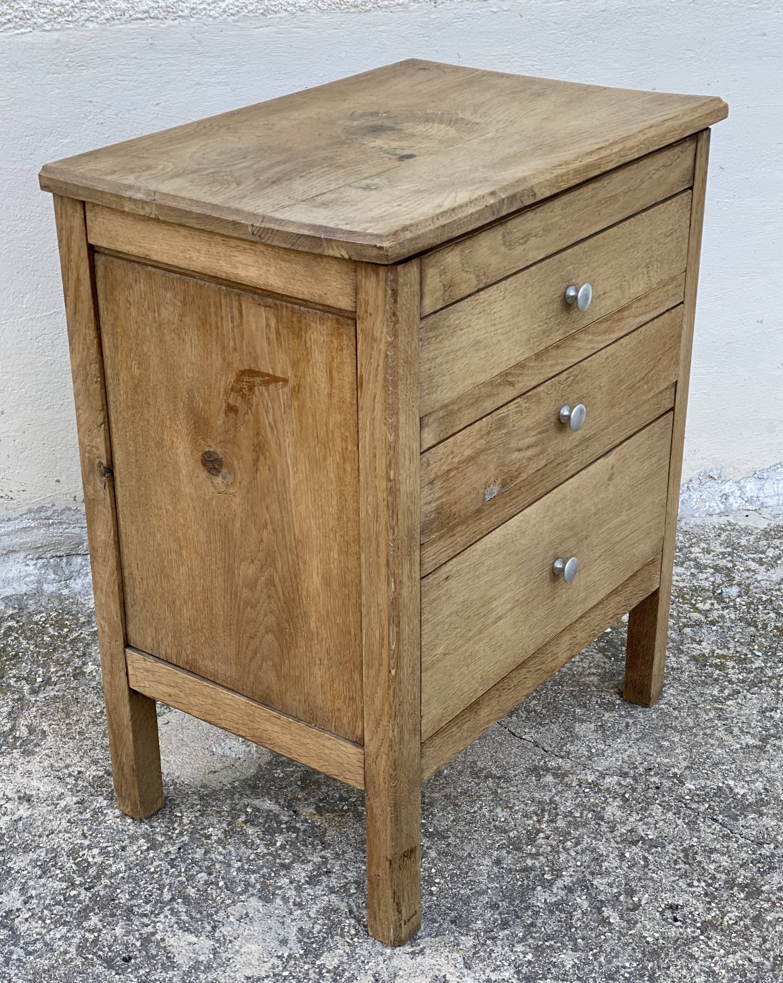Small workshop cabinet with 3 stripped oak drawers.