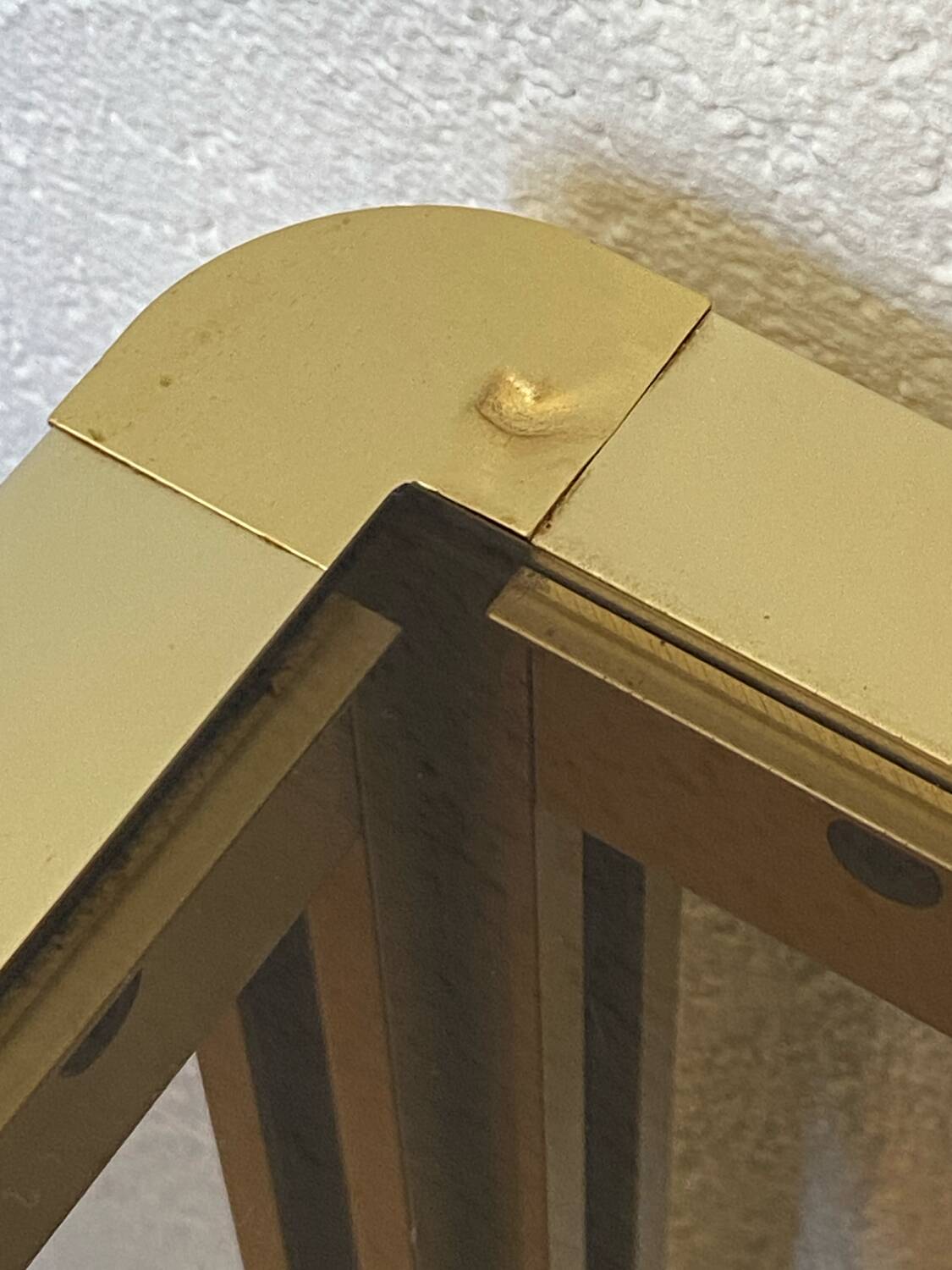 Regency style console table, in gilded metal and smoked glass