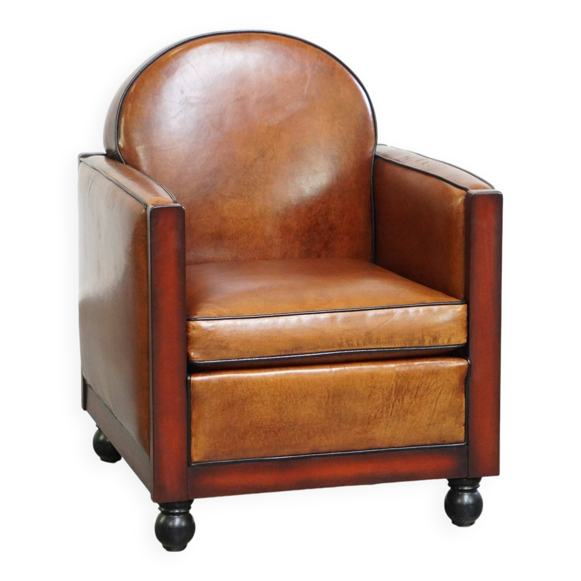 Cognac-colored sheepskin Art Deco design armchair in good condition
