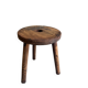 Three-legged wooden stool