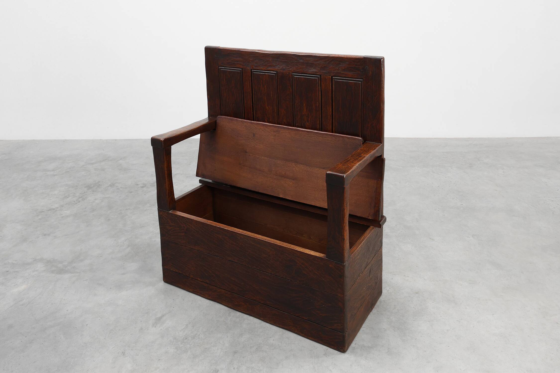 Rustic solid oak carved bench with storage compartment, France 19th century