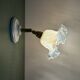 Vintage tulip glass wall light in transparent, slightly pearlescent white.