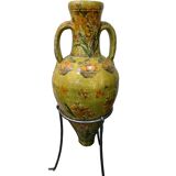 Large decorative vase with handles – painted floral design – on a metal stand