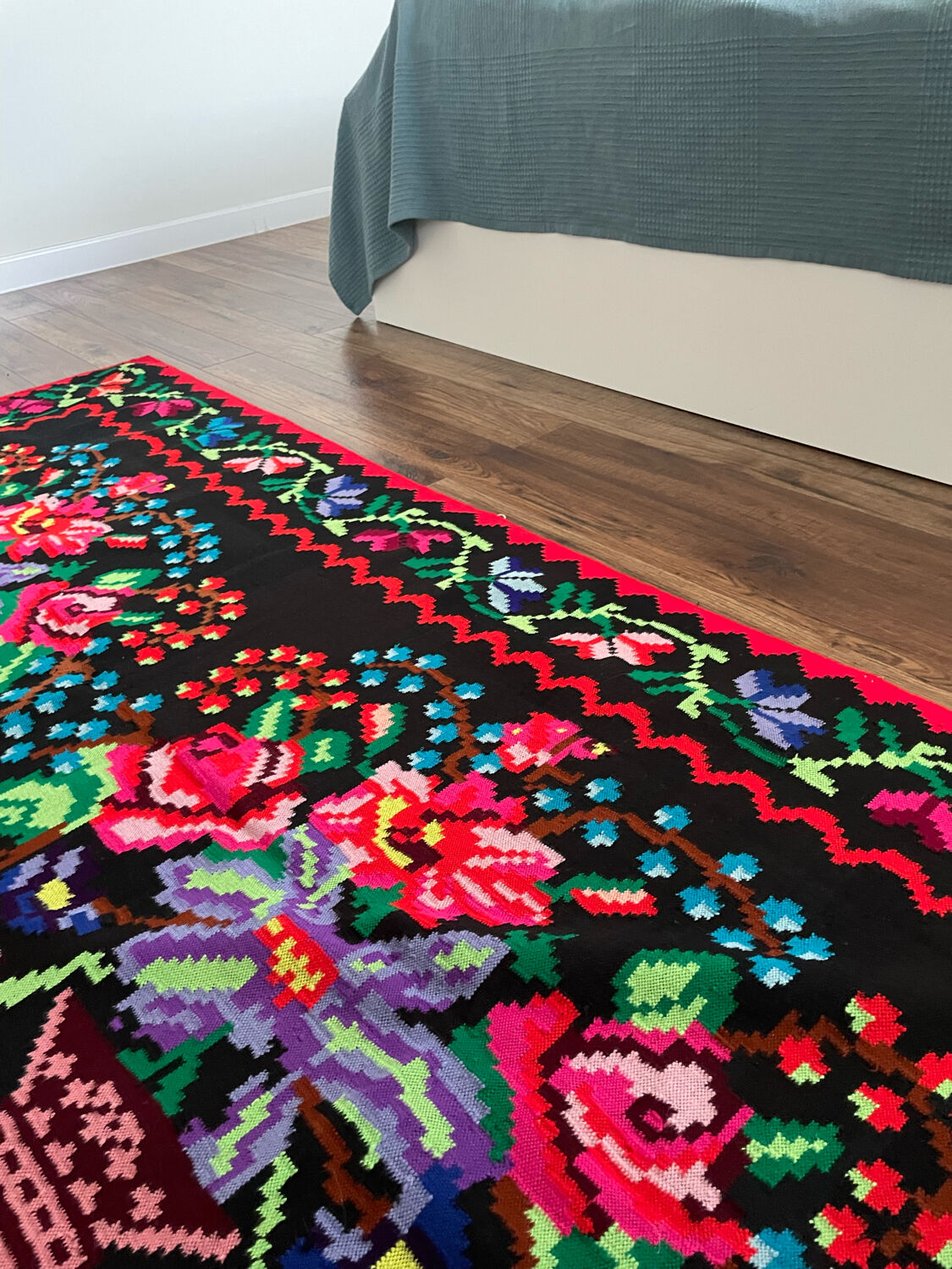 Vintage Romanian handwoven carpet with floral colorful design