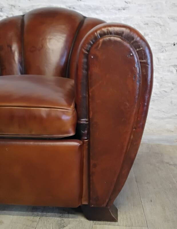 Club chair with floral backrest